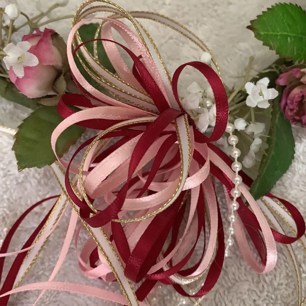 Rosebud and baby’s breath head wreath